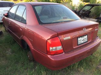 Mazda protégé 2002 parting out for parts