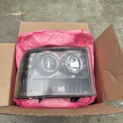 Recon Smoked Headlight Ford Super duty 99-04