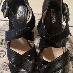 Michael kors leather studded Criss Cross heels black Size 10M. Leather upper rubber sole.
