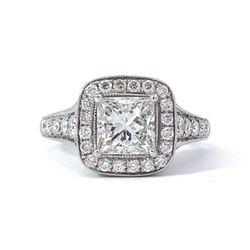 Designs 18K Diamond Ring 💍 ❤️ The center of this 18K white gold diamond ring is set with 1.38 carat princess cut diamond that has a clarity grade of 