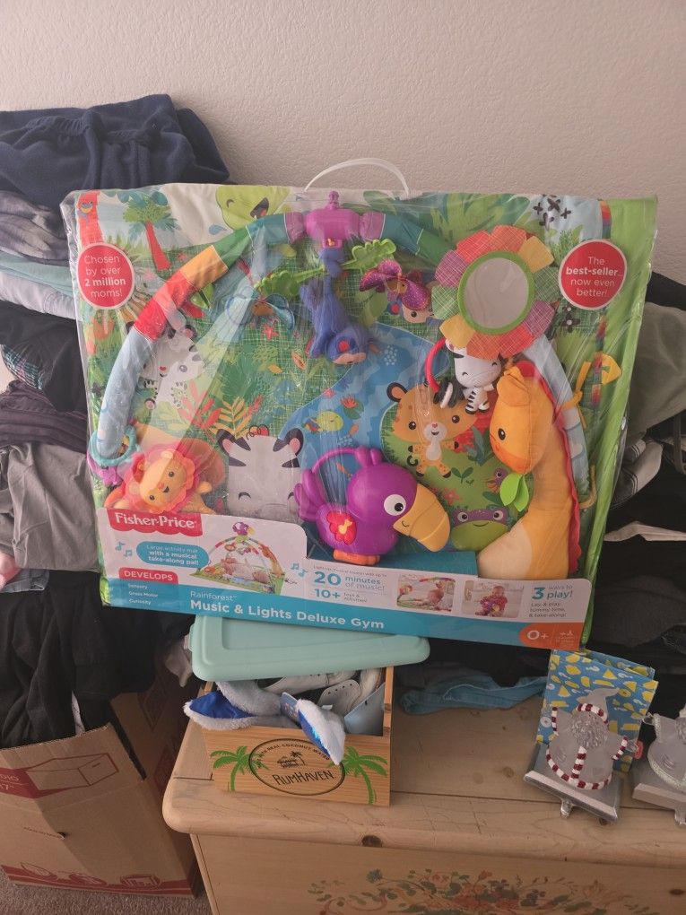 Fisher price rainforest, music and lights deluxe jim