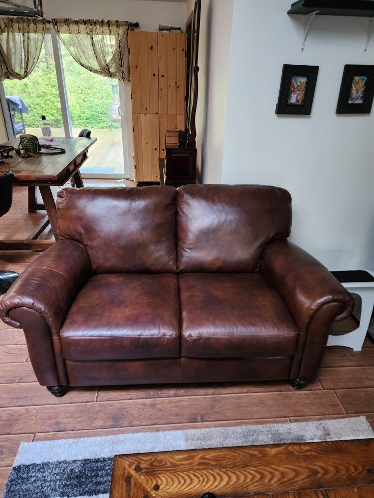 Nuttuzzi Edition Italian Leather Couch And Love Seat. 