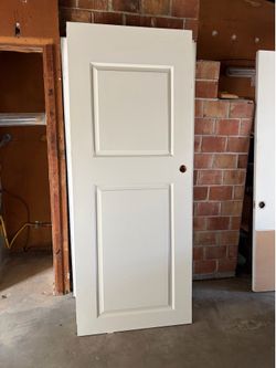 Five 32x80 solid core interior doors