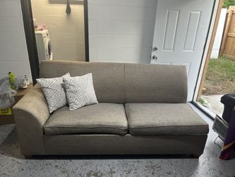 Dos sofás cama iguales