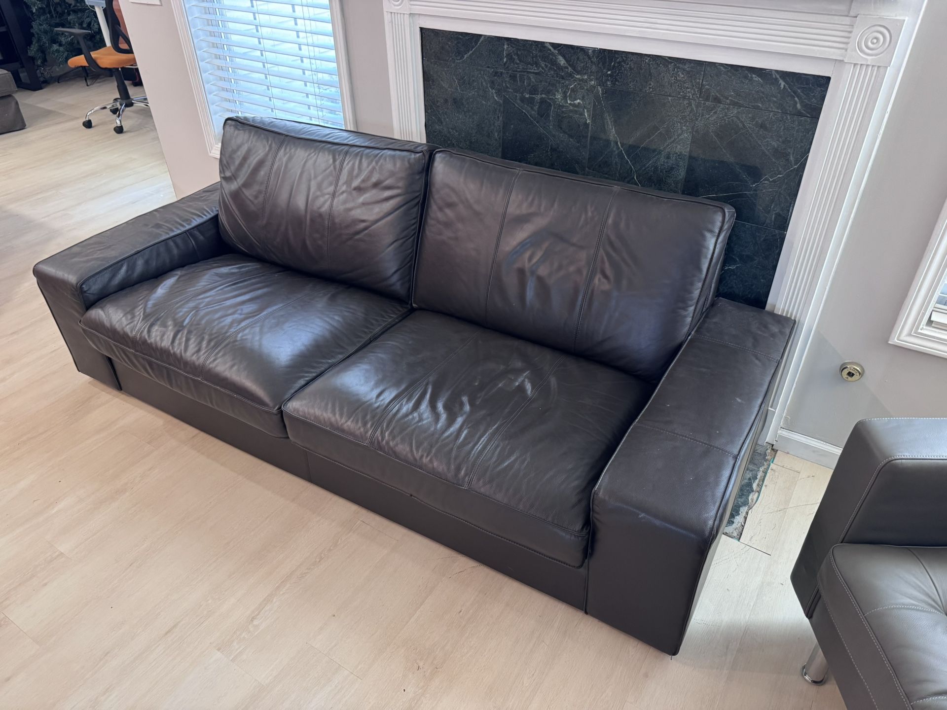 Espresso Leather IKEA Couch and Brown Chair