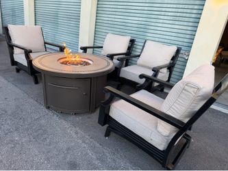 Patio,Outdoor furniture,4 Rocking chairs with cushions and Fire pit.