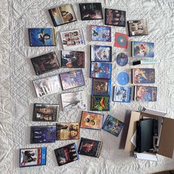 Wow all these DVDs, VHS’s and the DVD player $30