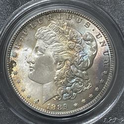 1889 P Morgan Dollar With Exceptional Rainbow Toning PCGS MS 64