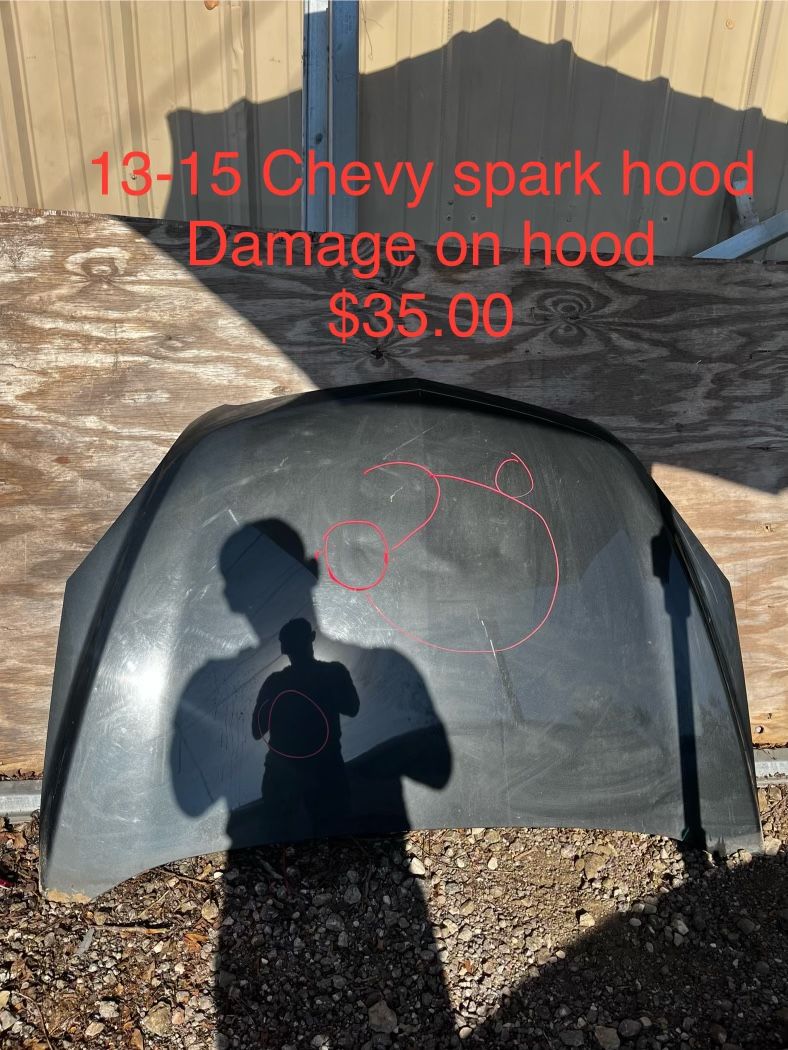 2013 - 2015 OEM Chevrolet Spark Hood has damage