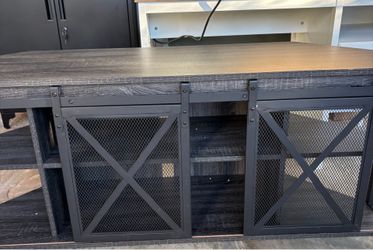 New TV Stand with Sliding Barn Doors 55"L 24"h 16"d They come packaged; they have two small dents