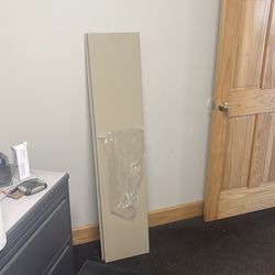 Fascia/wall panels. Tan sheet metal