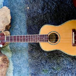 Ukulele With Mother-Of-Pearl And Lays And Abalone Trim