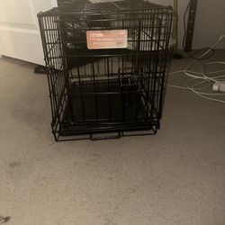 FREE SMALL DOG CAGE