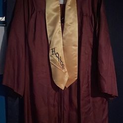 Red Cap And Gown With Gold Sash