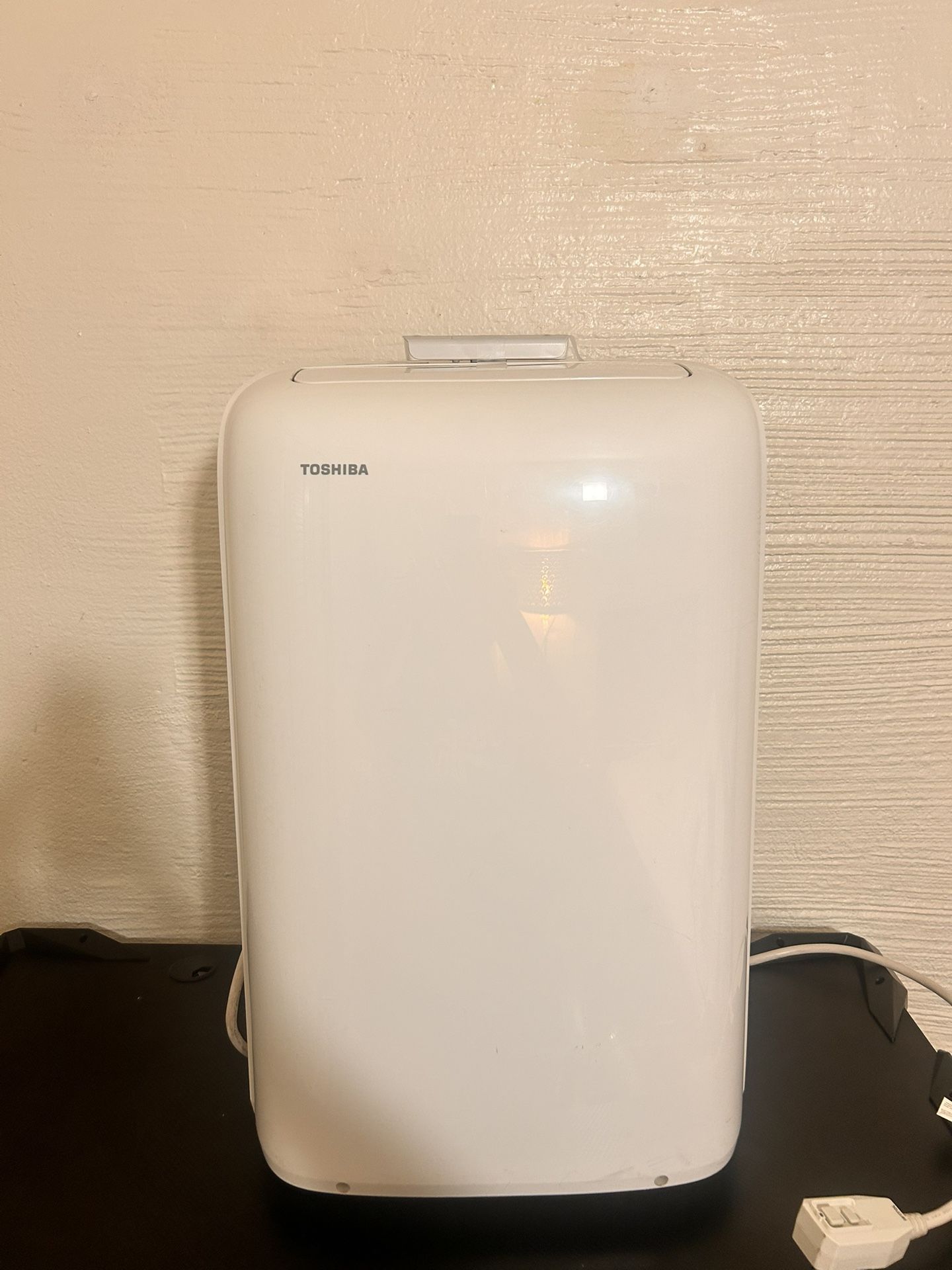 Toshiba 12000 BTU (8,000 BTU, DOE) 115-Volt Portable Air Conditioner with Dehumidifier and Remote Control RAC-PD1211CRU