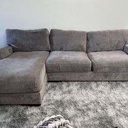 Ashley Frniture 2 piece sectional + storage ottoman + 4 pillows