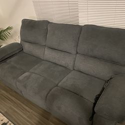 2 Piece Sofa. One owner. Owned for 1 year. Comes with coffee table