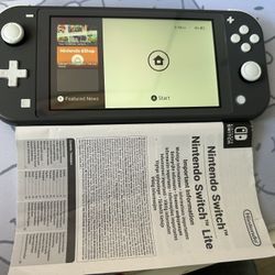 Nintendo Switch Lite Box,game,and Charger