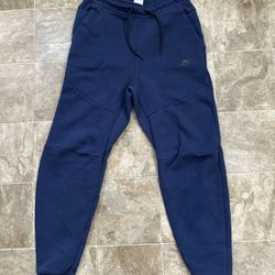 Blue Nike Tech Fleece pants 