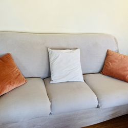 Red Couch With Cream Couch Cover 