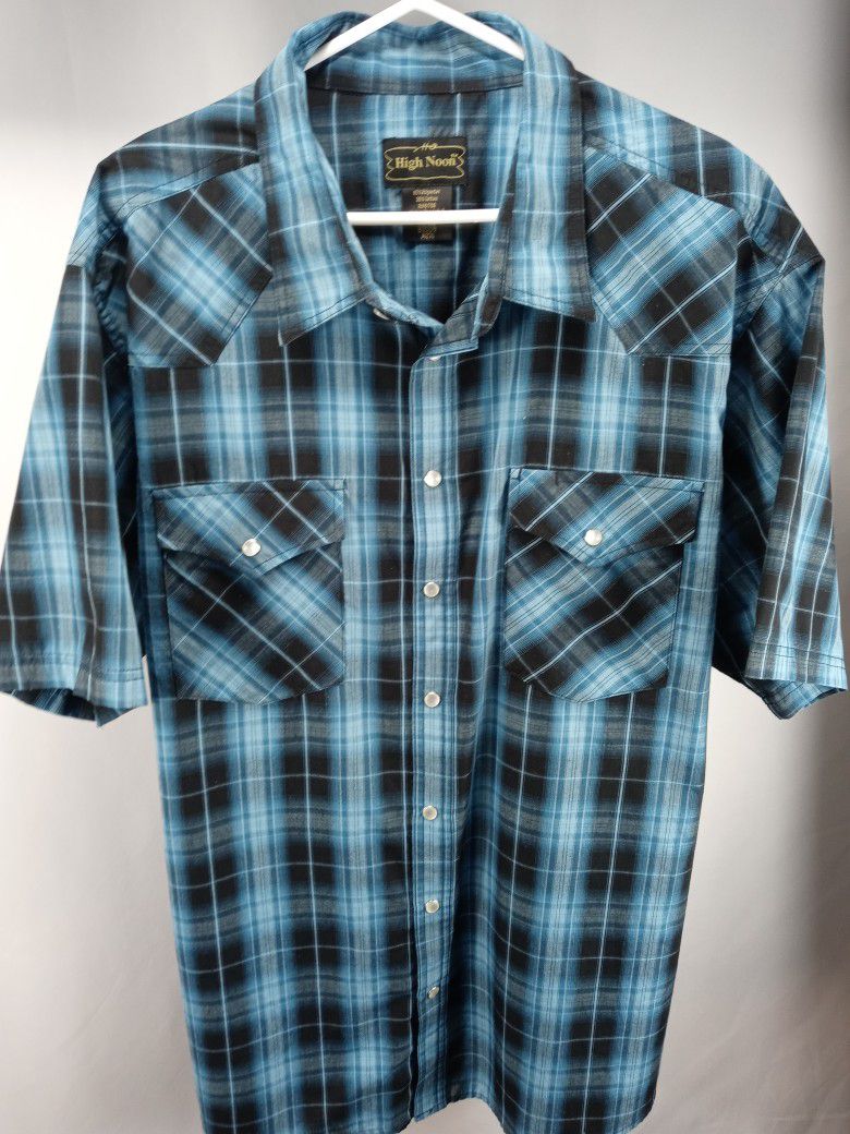 Vintage Cowboy Mens XL Plaid Pearl Snap Button Shirt. Great condition Awesome color combination and design. No fade polyester blend with pearl snap bu