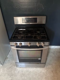 For sale used refrigerator and stove