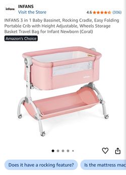 Pink baby bassinet