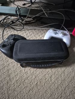 Nintendo Switch Console and Dock, Games, Carrying Case and 3 Controllers