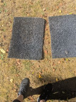 2 grey door mats
