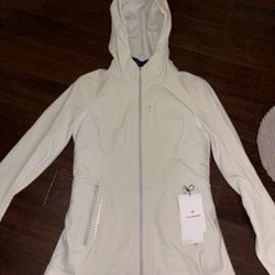 White lululemon jacket NEVER WORN size 10