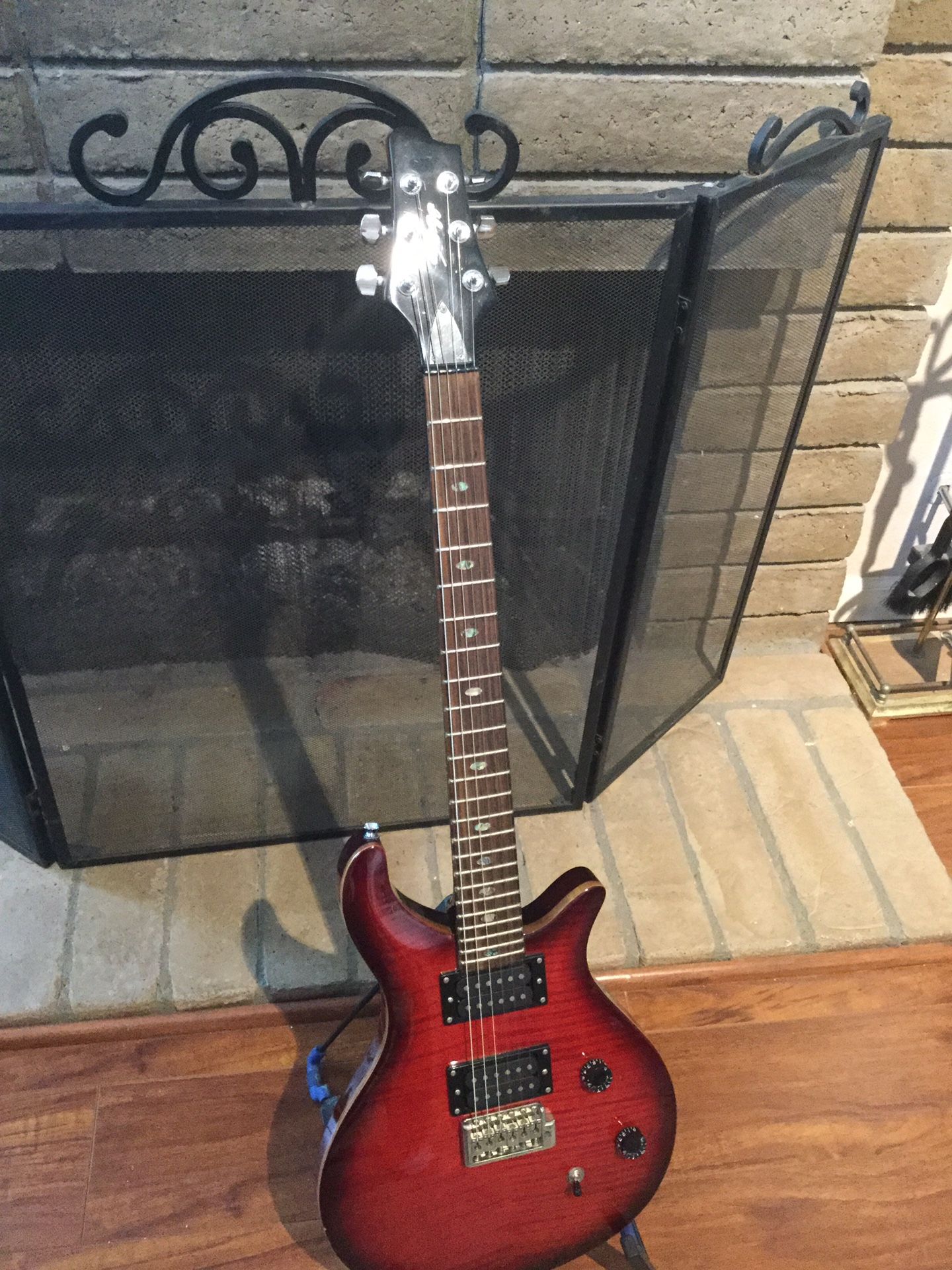 Stagg R500 solid body electric guitar. Brandywine