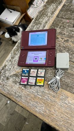 Nintendo DSi XL With 6 Games  $135