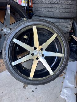22 inch black and machine staggered wheels