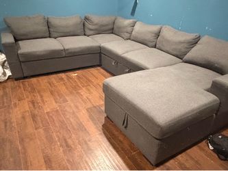 Grey sectional with pull out and storage