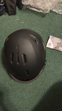 Salomon Driver (or Driver Pro) integrated visor ski/snowboard helmet.