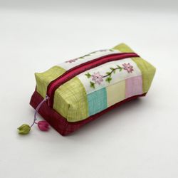 Floral hand-embroidered makeup travel bag