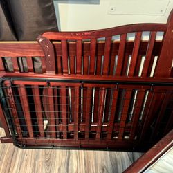 Cherry sleigh crib and changing table