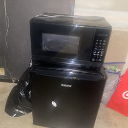 New Microwave And A Used Refrigerator 