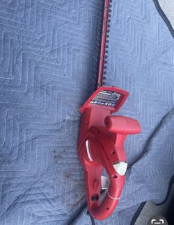 Red hedge trimmer