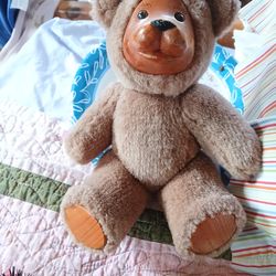 Brown bear with wooden face & feet
