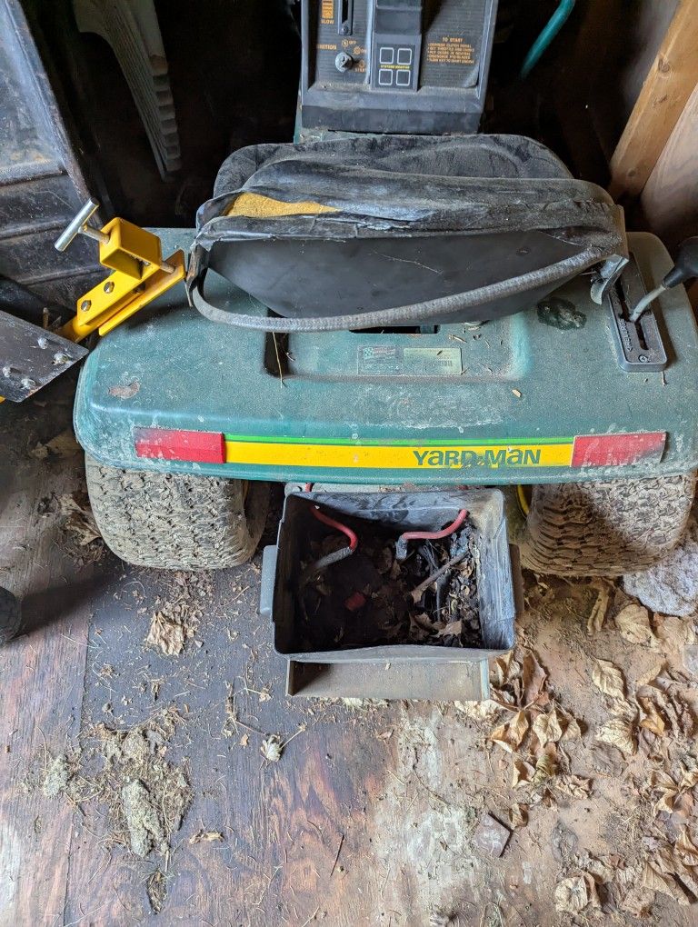two older riding lawn mowers I believe they thay can start+extras