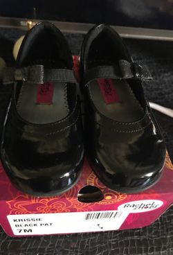 Black patent leather dress shoes