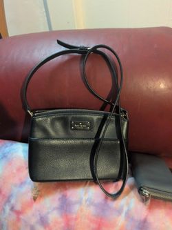 Millie crossbody bag from the Grove Street collection featuring a black textured leather finish.