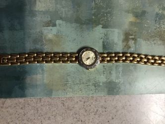 Womans gold Pulsar with diamond chips