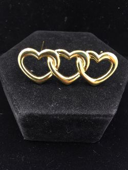 Vintage gold tone Triple linked heart brooch