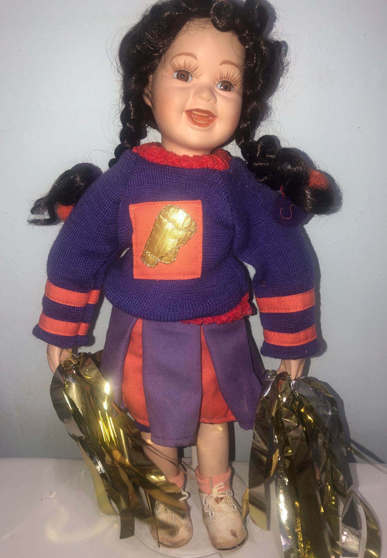 Porcelain cheerleader doll