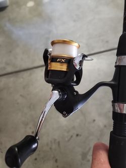 Shimano FX 2500  . spinning rod/reel combo