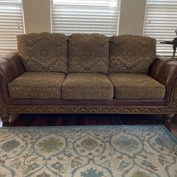 Brown Leather And Wood Engraved Couch.. Real Nice Conditions. 200obo
