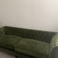 Velvet tufted Chesterfield-style sofa
