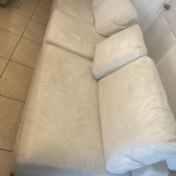 Used leather couch with normal wear and tear, well kept, no holes in it.